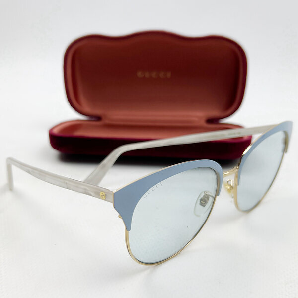 Солнцезащитные очки Gucci